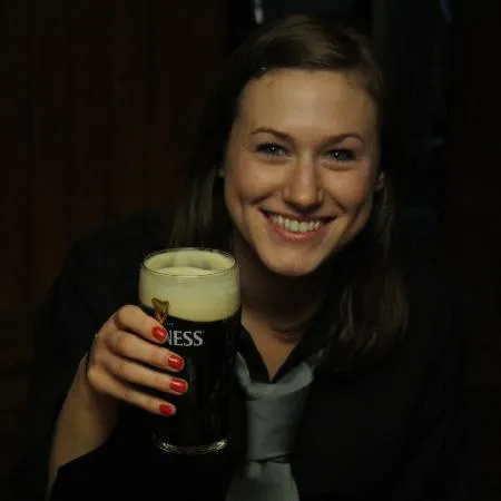 A visitor raising a Guinness pint at Furey's Pub
